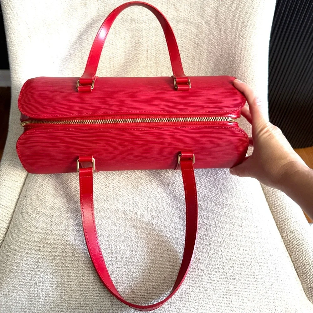 Authentic Louis Vuitton Soufflot bag M52227 red Epi leather with mini pouch